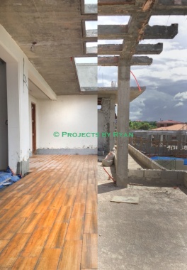 Old pic on the right...installed tiles on the left.