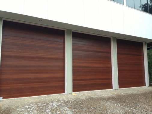 Panelift Doors - Merbau Timbercoat finish - 100% Garage Doors