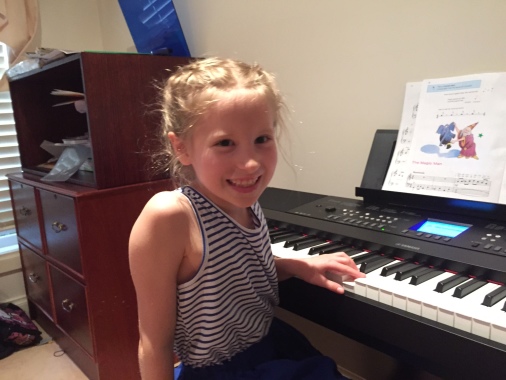 a happy student practicing at home