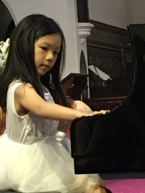 a pianist in the making - performing at one of our two yearly concerts