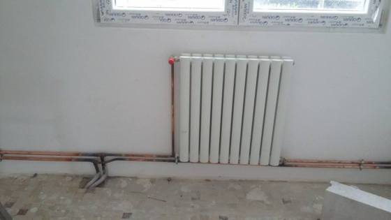 Mise en place de radiateurs.