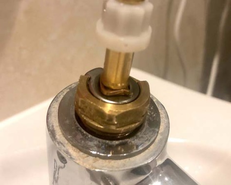 Tap Being Fixed by Plumbers in Pudsey