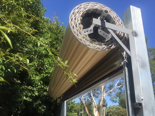 New Fence line roller door installation with outdoor motor