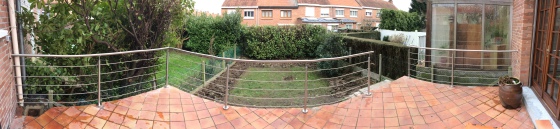 Création terrasse carrelage et garde corps inoxydable.