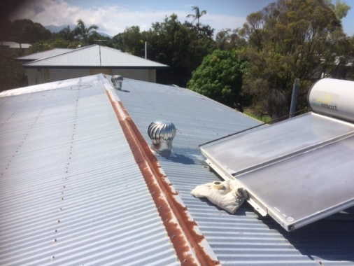 Before photo of a roof needing a little TLC