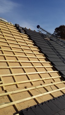 Rénovation de toiture avec complément d'isolation en fibre de bois incorporé