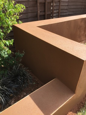 A garden wall that I just rendered Leaving a float & sponge finish 