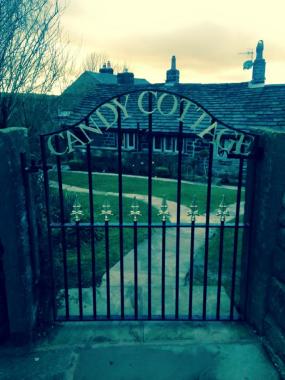 Bespoke gate showing the house name