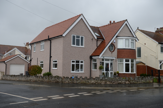 Two storey side extension comprising of a new kitchen/ diner, utility and master en-suite bedroom. Plus a new garage.