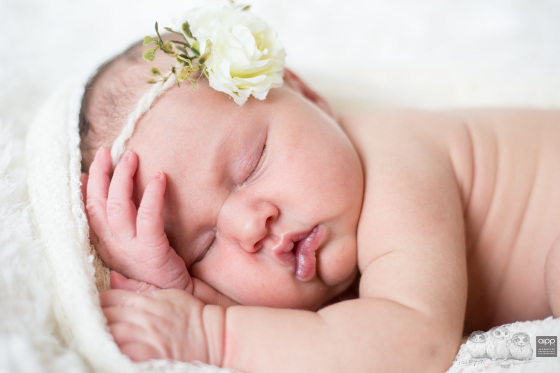 Awww look at those lips and newborn rolls