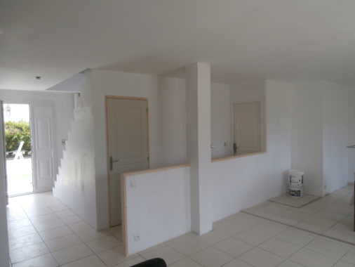 rénovation complète d'un pavillon comprenant une surévélation et  aménagement de comble