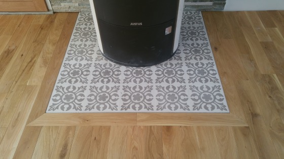 Pose de parquet autour d'un poele