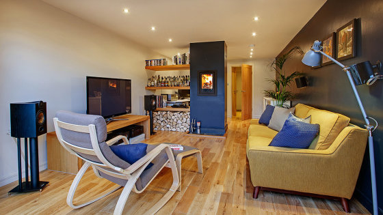 Offering both a work station and a place to relax, this Man Cave delivers on many fronts!